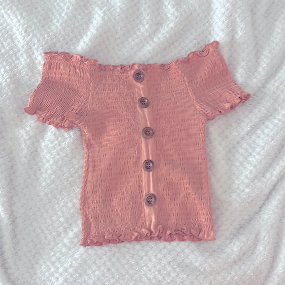 Shoulder-less pinkish crop top